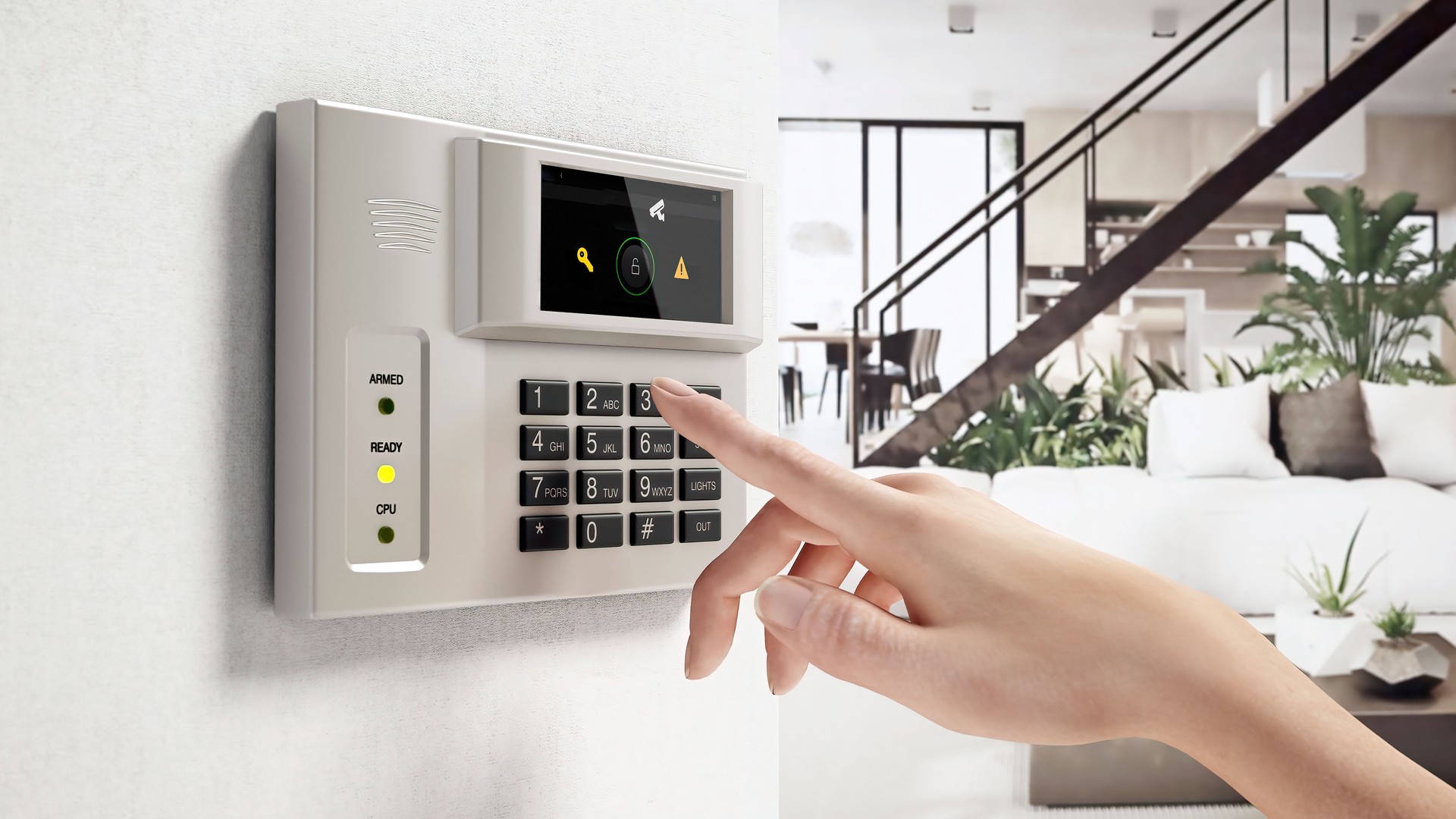 A person entering a security code on a digital keypad in a modern home living room